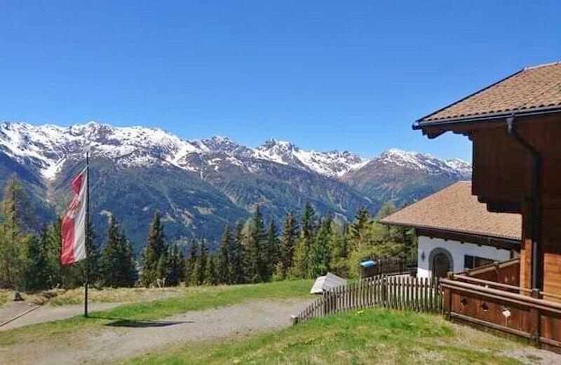 speikbodenhuette-sommer-aussicht-fahne-c-speikbodenhuette.jpg